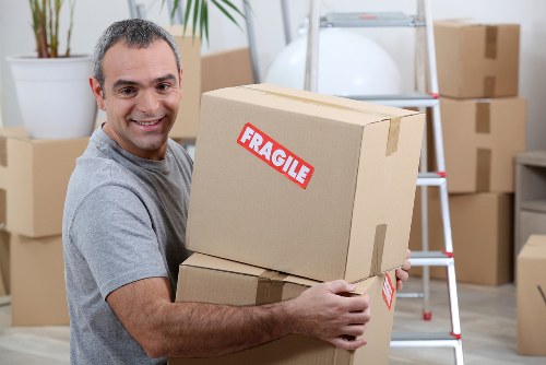 Person using an accessible moving company website on a laptop