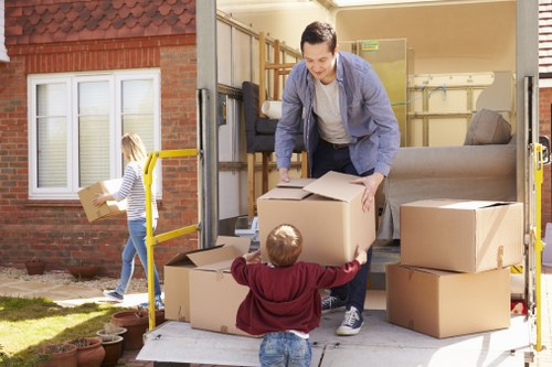 Moving company team preparing a transparent quote for a London flat move