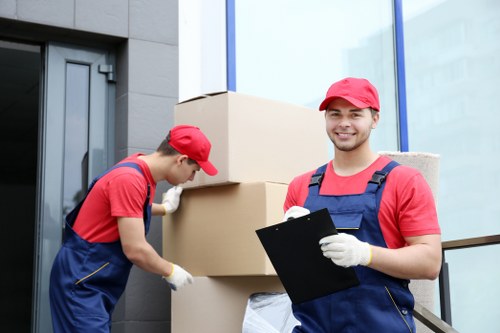 Removal team preparing a London house move outside a residential property