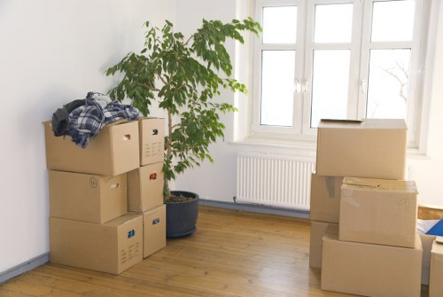 Loading furniture and boxes into a moving truck in London