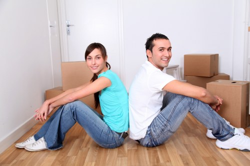 Loading furniture and boxes into a van for a London relocation