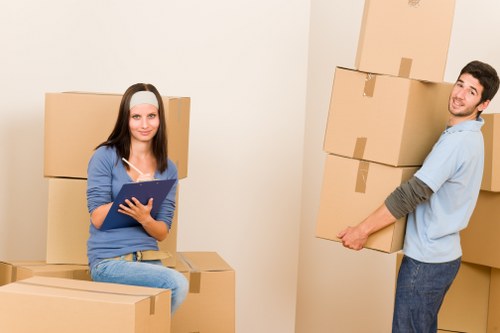 Professional London movers preparing furniture for safe transport