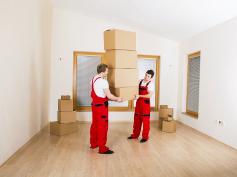 Packed boxes and furniture ready for house removals in London